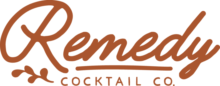 Remedy Cocktail Company logo with cursive text and a small leaf design.
